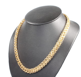 A 9ct yellow gold flat link necklace 29.9 grams, 51cm 