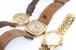 A gentleman's 9ct yellow gold Rotary wrist watch, a lady's gold cased wrist watch and a lady's Rotary quartz gilt cased wrist watch 