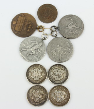 Four silver sports fobs and minor fobs and medallions