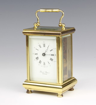 David Peterson, a 20th Century 8 day carriage timepiece with enamelled dial and Roman numerals contained in a gilt metal case 