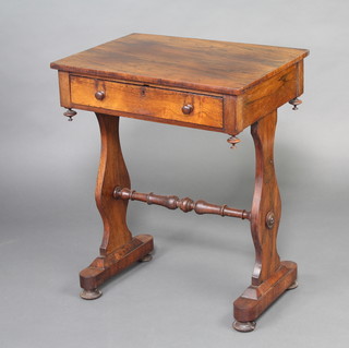 A Victorian rectangular rosewood work table fitted a drawer and raised on shaped supports with H framed turned stretchers 72cm x 59cm x 43cm d