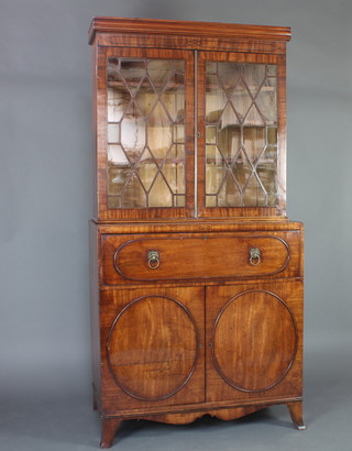 A Georgian mahogany secretaire bookcase, the associated top with moulded cornice fitted adjustable shelves enclosed by astragal glazed panelled doors, above a well fitted base having 4 secret compartments above a pair of panelled doors, raised on bracket feet 218cm h x 107cm w x 56cm d 