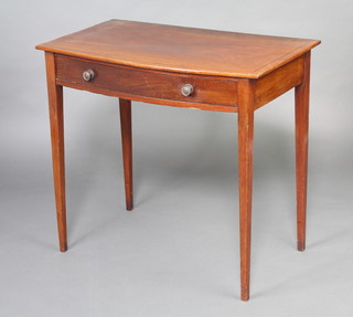 A George III inlaid mahogany bow front side table with ebonised stringing, fitted 1 long drawer and raised on square tapered supports 75cm h x 81cm w x 50cm d 