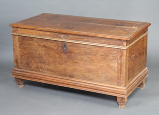 A Continental elm coffer with hinged lid and iron hinges, fitted a glove box, raised on turned supports 71cm h x 131cm w x 66cm d