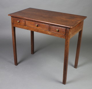 An 18th Century oak side table fitted 1 long and 2 short drawers raised on square tapered supports 72cm h x 83cm w x 47cm d 