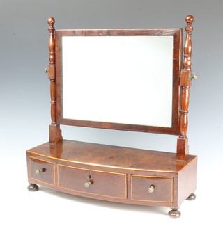 A 19th Century rectangular dressing table mirror contained in a mahogany swing frame, the base fitted 1 long drawer flanked by a pair of short drawers raised on bun feet 50cm x 47cm x 19cm 