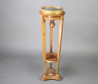 A 19th Century French Empire style walnut cylindrical jardiniere stand with green veined marble top and pierced gallery, raised on square tapered supports with undertier and triform base 103cm h x 31cm  