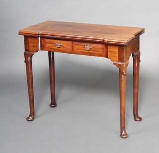 A Georgian mahogany tea table, the base fitted 2 short drawers with replacement brass drop handles, raised on club supports 71cm h x 81cm w x 40cm 