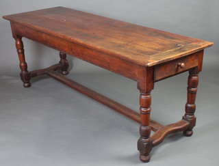 An 18th Century Cherry rectangular dining table, the top formed of 3 planks, fitted 2 frieze drawers, raised on turned and block supports with H framed stretcher 76cm h x 194cm l x 67cm w  