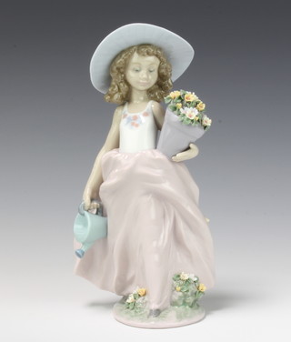 A figure of a girl holding a pot of flowers and a watering can for The Collector's Society 1999 no.7676 23cm, boxed
