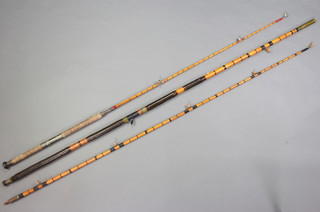 An early 13' cane beach casting rod with ceramic eyes together with an early split cane boat rod 