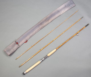 A vintage Avon Shaw split cane 10'6" Avon/float fishing rod in a grey cloth bag 