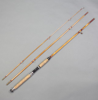 A 10'6" split cane Avon/float fishing rod with burgundy and gold whipping 