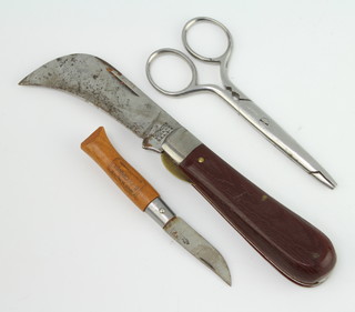 A Kutmaster pruning knife, the blade marked Kutmaster Utica. New York USA S-4, an Opinel folding knife and a fish disgorger 
