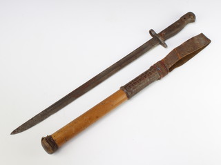 A 1907 Wilkinson Patent bayonet (no scabbard and blade corroded) together with an Eastern charged club 