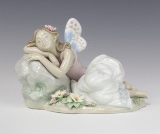 A Lladro Privilege figure of a reclining fairy no.7694 11cm, boxed