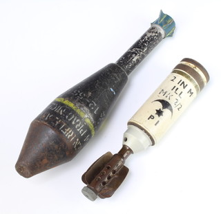 A Second World War incendiary bomb marked 2 IN Mill Mk 2/2 together with a mortar shell 