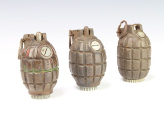 3 Mills bomb hand grenades the bases marked no.5 Mk1, no.36 M and 40PDC no.36M 