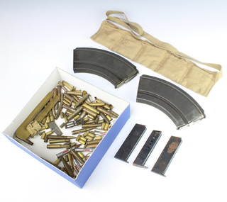 Two bren gun magazines, 3 pistol magazines, a Bandolier with cartridges and other cartridges etc 