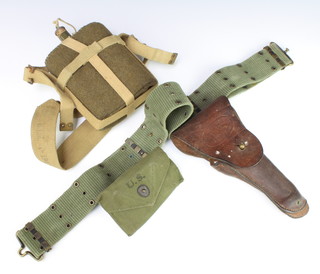 An American leather pistol holster together with a webbing belt and ammunition pouch  marked and dated Crump 1942 together with a water bottle