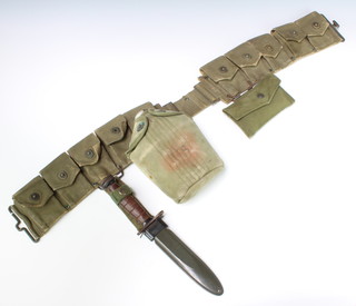 An American webbing belt marked Long6-18 with water bottle and ammunition clips together with an American M1 bayonet the scabbard marked US,M8A1 
