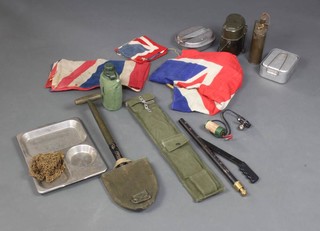 A trenching tool in a webbing case, an aerial in webbing case, 4 mess tins, 3 union flags and other items