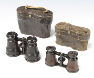 A pair of Jumelle Duchesse opera glasses complete with a leather carrying case together with 1 other pair 