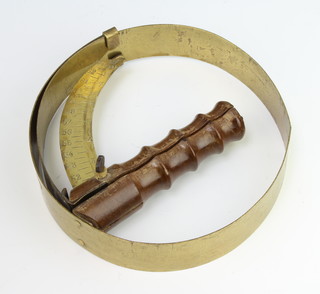 A Continental circular brass hat gauge marked E'pose 
