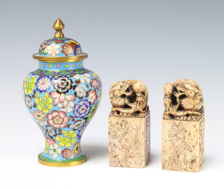 A blue ground and floral patterned cloisonne enamelled baluster shaped urn and cover 15cm x 7cm and 2 carved marble seals decorated dogs of fo 9cm x 4cm x 4cm 