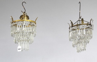 A pair of circular gilt metal 3 tier light fittings hung lozenges 24cm x 23cm 