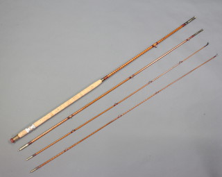 A Scarwood 2 piece split cane fishing rod with 2 spare tips 
