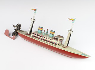 A tinplate clockwork model of a 2 masted boat, the upper section marked O866 15cm x 40cm x 9cm  
