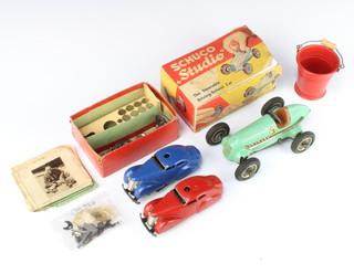 A Schuko The Steerable Driving - School Car no.1050 boxed (there is some damage to the box and flap) together with 2 other Schuko cars 3000 (1 is damaged) 