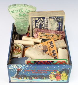 A Dewhurst's machine twist box, various vintage cottons and other bandages and miscellaneous sewing items etc
