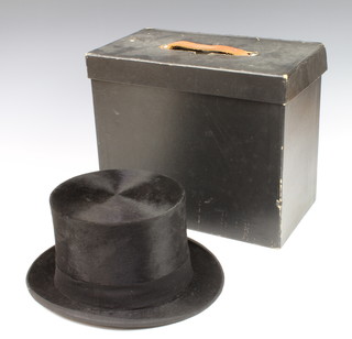 A gentleman's top hat by Honisot of London, approx. size 7 complete with carrying case 