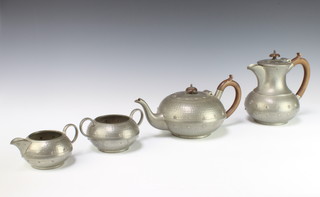 A Don Pewter 4 piece tea service comprising teapot, hot water jug, twin handled sugar bowl and cream jug, the base marked Don Pewter 1452 