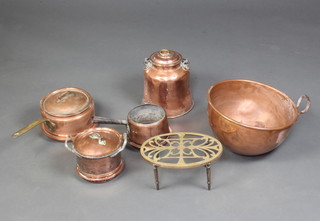 A copper bell shaped canister with polished metal swing handle 25cm x 20cm (some dents) and an on oval pierced brass footman, a circular copper bowl, 3 copper saucepans 