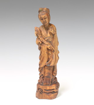 A Chinese carved hardwood figure of a standing Geisha 31cm x 7cm x 6cm 