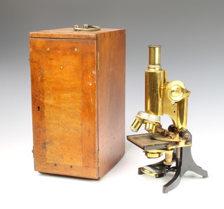 J Swift and Sons of London, a student's 19th Century brass single pillar microscope, complete with  mahogany case  