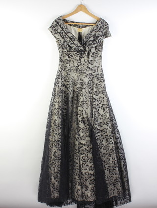 Emenson of London, a lady's 1950's black and white evening dress together with a lady's blue evening dress 