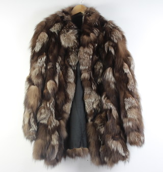A lady's silver fox fur jacket 