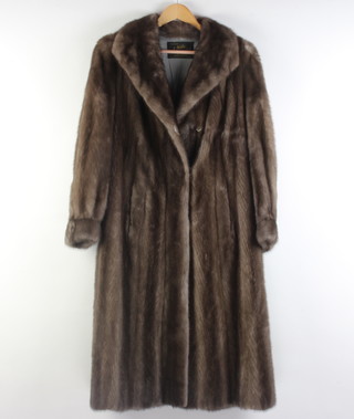 J Hobbs Ferriers of Prince George, British Columbia, Canada, a lady's full length  mink coat 