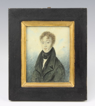 A 19th Century watercolour portrait miniature of a young gentleman wearing a frock coat 9cm x 7cm 
