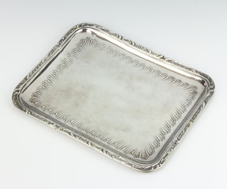 A 19th Century Continental repousse silver rectangular tray with scroll decoration 21cm x 17cm, 250 grams 