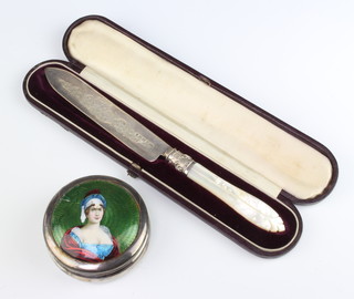 An Edwardian circular silver and enamelled trinket box decorated with a portrait of a lady Birmingham 1901 8cm, together with a Victorian silver bladed bread knife with mother of pearl handle 