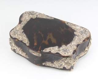 An Edwardian silver mounted tortoiseshell trinket box with scroll decoration raised on ball feet, the underside with a plaque Mother's Union 1901-1915, London 1901, maker HA 16cm 