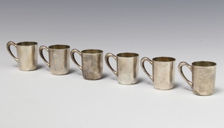 A set of 6 Continental 800 tots in the form of mugs 3.5cm, 105 grams