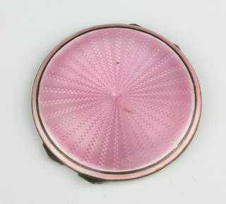 A silver and pink guilloche enamel compact, Birmingham 1936, 7.5cm, 82 grams
