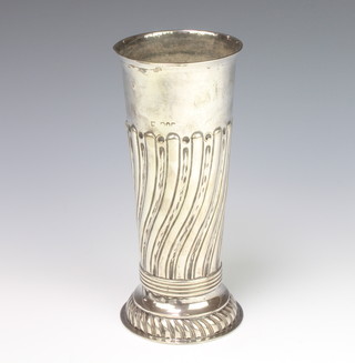 An Edwardian repousse silver fluted tapered vase 22cm, 294 grams