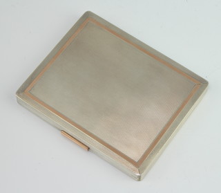 A rectangular silver and gold inlaid rectangular cigarette case 10cm x 8cm,  London 1969, maker Alfred Dunhill, 160 grams